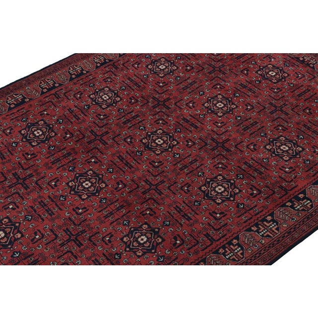 Handknotted in wool circa 1960-1970, this rare vintage rug believed to hail from Khal Mohammadi is the latest to join Rug...