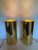 A striking pair of vintage brass cylinder table lamps designed in the style of Robert Sonneman, embodying the clean...