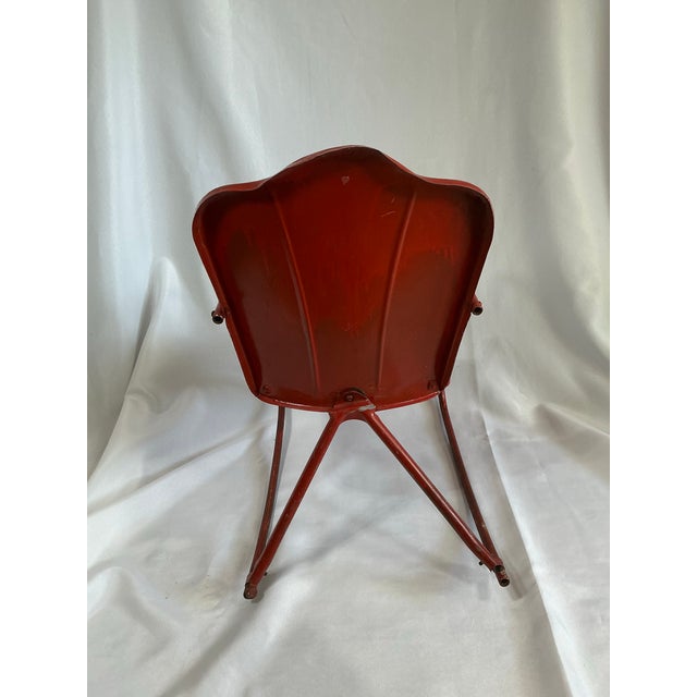 This rare find, is a vintage, John Gordon Rideout designed Clamshell Metal Child's Rocking Chair, for the Junior Toy...