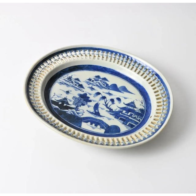 Antique hand-painted openwork porcelain platter. Made in the mid 19th century in Canton, China.