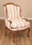 High Quality Custom Upholstered Solid Walnut Frame French Style Armchair with Intentionally Distressed Finish