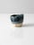 This is a vintage studio pottery vessel. Hand-crafted, the wabi sabi pottery bowl has a dipped blue glaze with rustic slab...