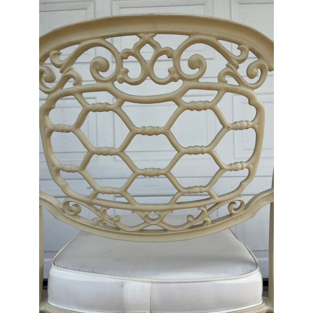 1960s Hollywood Regency era aluminum cast chairs. Banana leaf motif, palm leaf motif and rope motif mismatched set. Great...