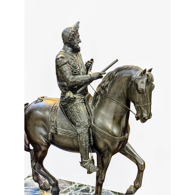 a 19th-century bronze sculpture replicating Andrea del Verrocchio's famous equestrian monument to Bartolomeo Colleoni.The...