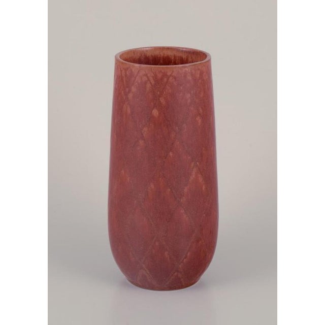 Gunnar Nylund (1904-1997) for Rörstrand, Sweden. Ceramic vase with geometric pattern. Glaze in brown hues. Mid-20th...