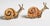 Offering a rare pair of Italian brass & bamboo beaded snail figurine paperweights, each signed Tarzia-Firenze-Italy, circa...