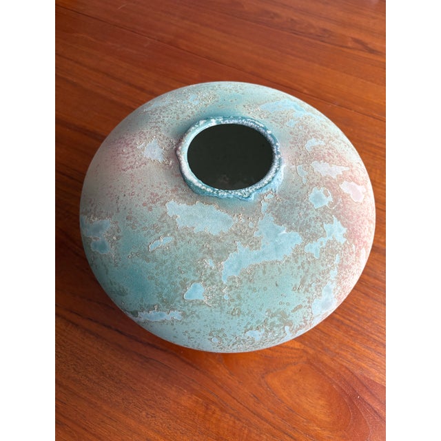 Nice large Tony Evans Raku pottery from the Ancient Sands line. 12” wide x 8” tall. Excellent raku colors, mottled glaze,...
