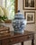 A classic blue and white ginger jar, decorated throughout with delicate Chinese landscapes and floral motifs. The pattern...