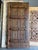 1920s Antique Indian Carved Wood Door With Brass Studs – Rustic Hinged or Sliding Barn Door 96 For Sale - Image 5 of 8