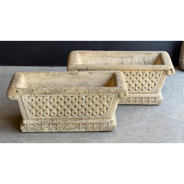 A fine pair of Cotswold Studios rectangular garden planters or troughs of composition stone from England - each featuring...