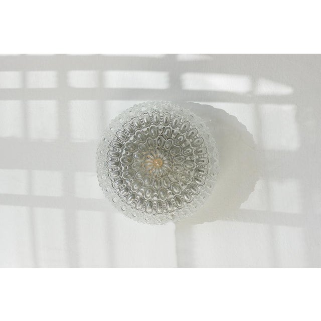 The Sirius ceiling lamp, designed by Helena Tynell for Glashütte Limburg, is an icon of 1960s and 1970s design. The shade...