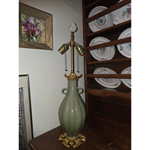 Beautiful antique bronze mounted lamp.