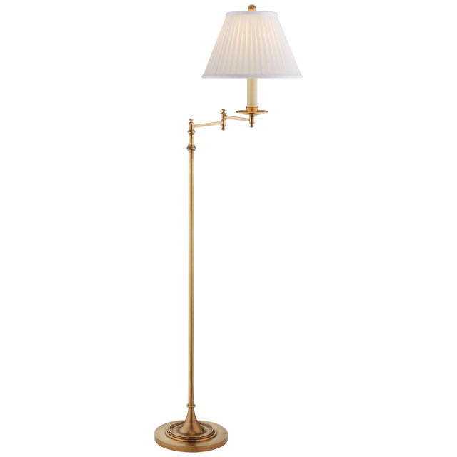 Dorchester Swing Arm Floor Lamp in Antique-Burnished Brass with Silk Shade Designer: Chapman & Myers Height: 51" - 64"...
