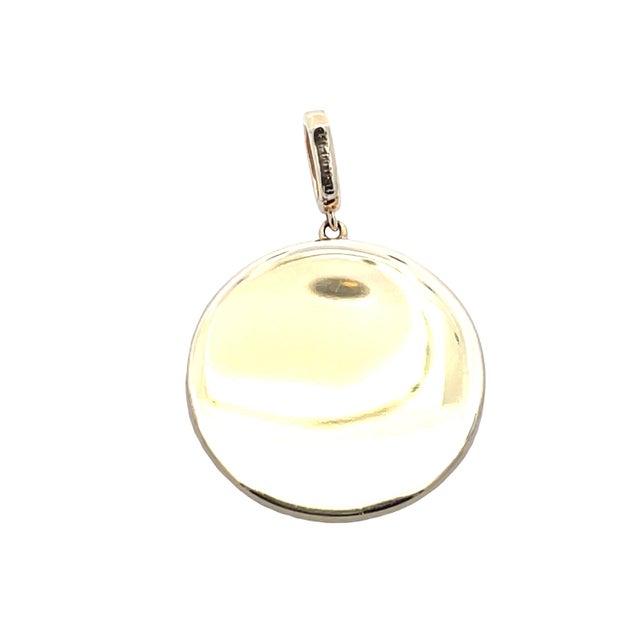 Crafted in solid 14K yellow gold, this Leo zodiac charm features a bold lion motif framed by sparkling diamonds totaling...