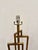 Modern Sculptural body Antique Brass Lamp on rectangular acrylic base. Showroom floor sample.