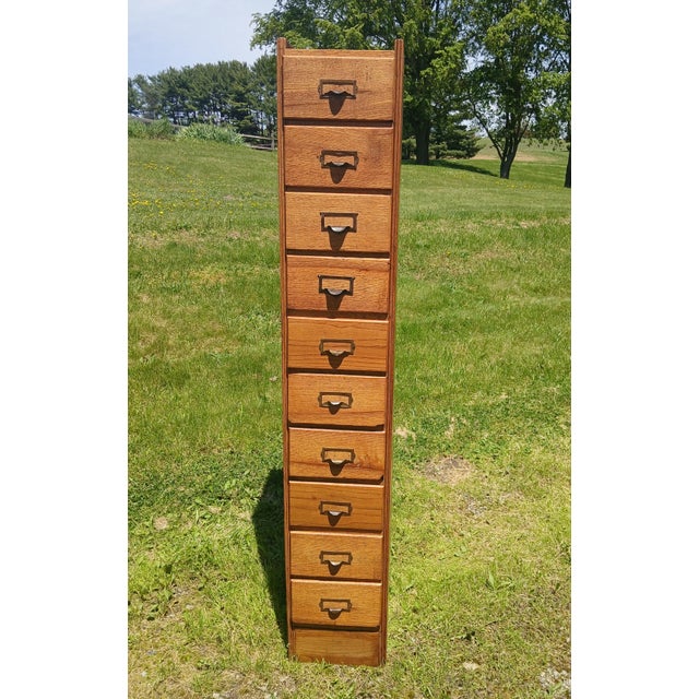 Antique Oak 10 Drawer File or Storage Cabinet 1920s An antique solid oak ten drawer file or storage cabinet dating back to...