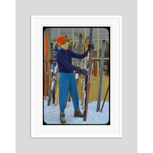 Getting Ready 1955 by Toni Frissell A stylish female skier prepares her skis, 1955. Antoinette Frissell Bacon (March 10,...