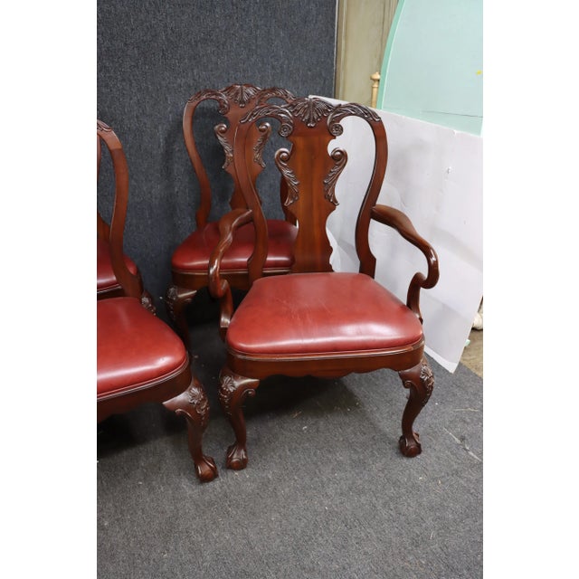 8 Chippendale Style Mahogany Carved Dining Chairs, open carved backs with acanthus carved decoration, red leather seats,...