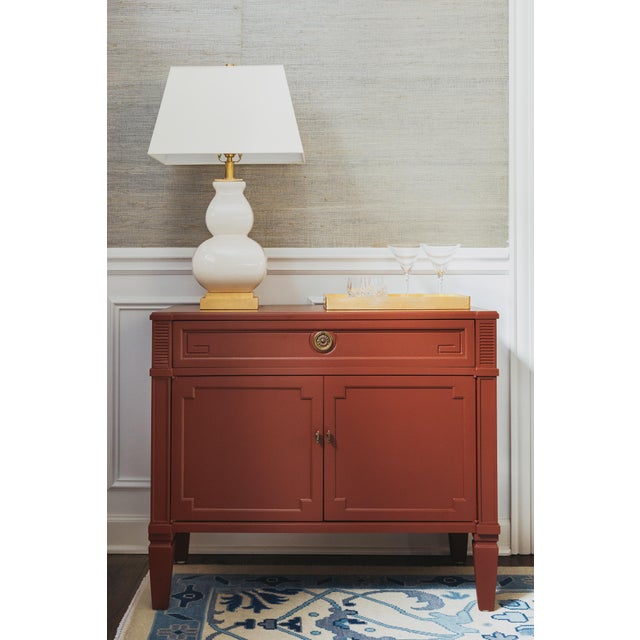 Drexel Furniture cabinet is from the Palazzo Collection circa 1960s. Refinished in a Cottage Red paint color with a satin...