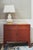 Drexel Furniture cabinet is from the Palazzo Collection circa 1960s. Refinished in a Cottage Red paint color with a satin...
