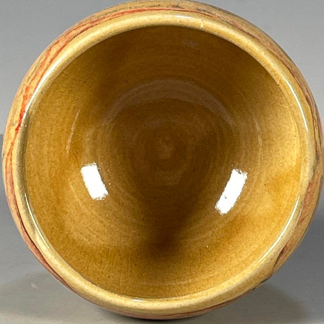This is a striking vintage ceramic teabowl, crafted in the style of traditional "marbled clay" or jiaotai wares, which...