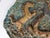 A large and important hand-decorated terracotta wall plaque/sculpture by the Faenza master Angelo Ungania, likely created...