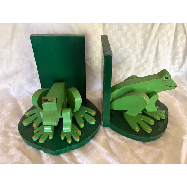 A pair of handmade frog bookends. These whimsical bookends belong in a child's room on the side of classic books. The...