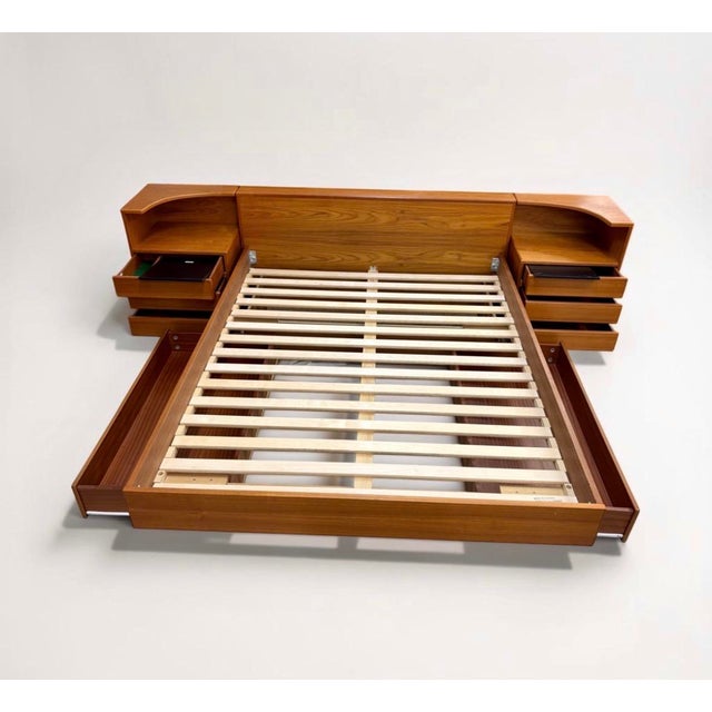 Canadian-made Mobican teak queen bedframe in excellent condition. Relatively easy assembly - nightstands rest beside the...