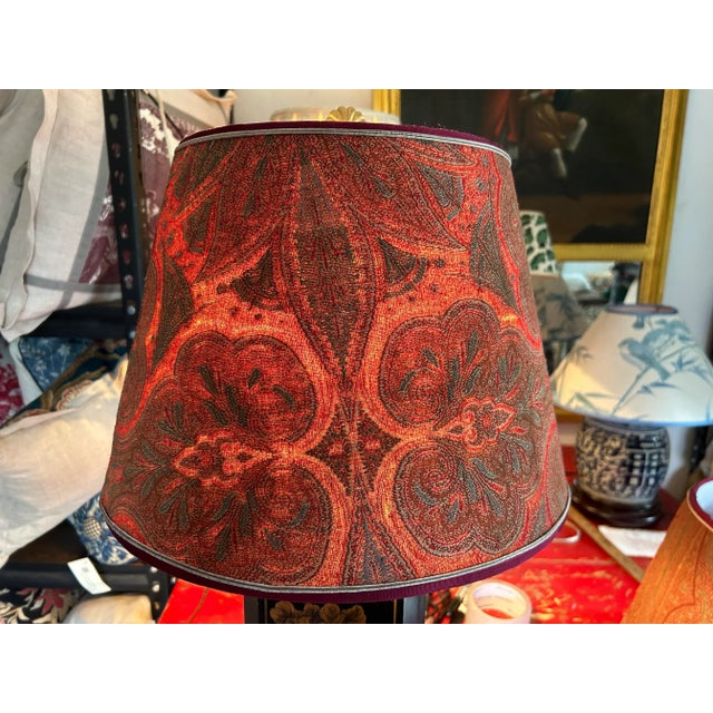A pair of lampshades hand made from a 19th century hand loomed Scottish wool paisley. Measurements top10” bottom 15” side10”