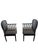 Offering an exceptional pair of Andover black lacquered spindle armchairs. The chairs were designed by Davis Allen and...