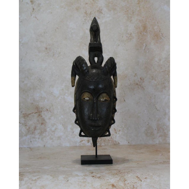Guro masks are traditional African masks from the west coast of Africa, specifically the Ivory Coast. The Guro, or Gouro,...