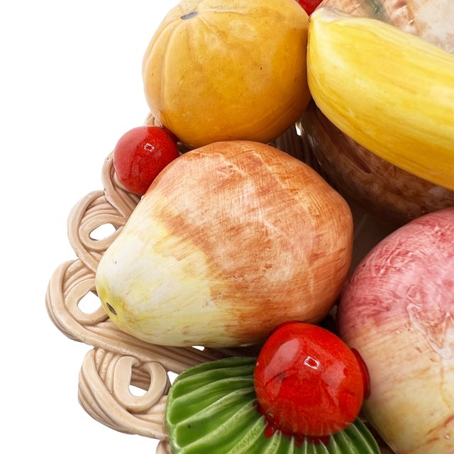 An exquisite Italian Bassano hand-painted ceramic fruit centerpiece, masterfully crafted in the celebrated tradition of...