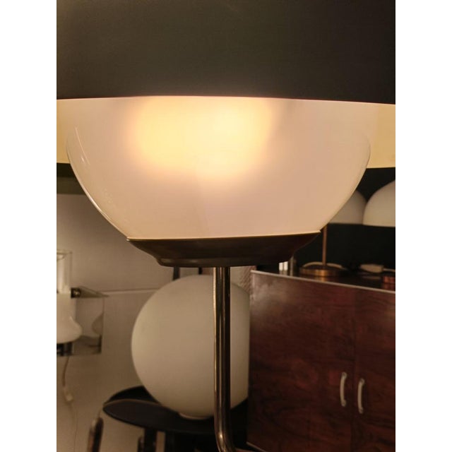 An extremely rare and exceptional ‘Mikado’ table lamp, a masterpiece of Italian design created by the architect Luigi...