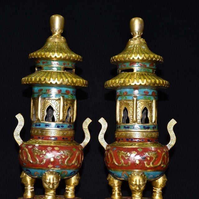 A spectacular and highly detailed pair of vintage Chinese cloisonné pagoda censers, sourced from a private collection....