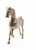 Solid brass standing horse figure. Patina is natural to the metal. The horse is depicted in mid stride. Battlefield...