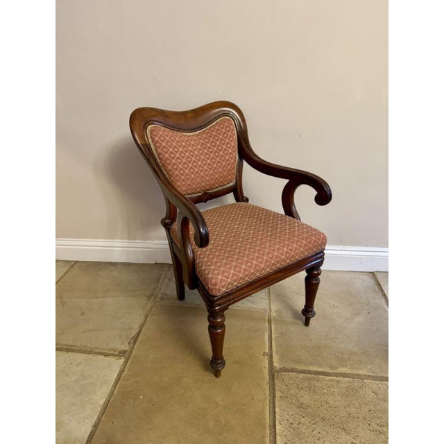 Stunning pair of quality 19th Century mahogany desk chairs having a quality pair of antique mahogany desk chairs with...