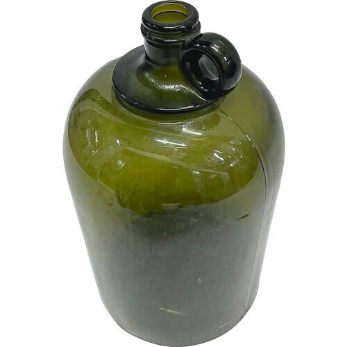 Medium antique green glass wine jug with small round jug style handle. Marked: "D, G, 1" on the underside