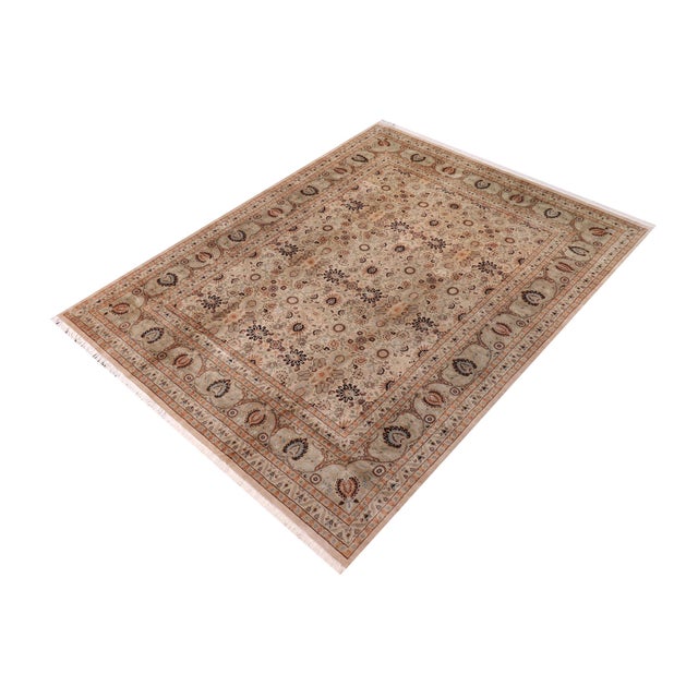 Designed with mesmerizing intricacy and gorgeous color palette, this hand-knotted masterpiece demonstrates the beauty and...