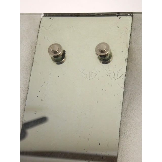 Original French wall lamp with a beautifully aged mirrored surface in the center. Overall in good condition. Rewired and...