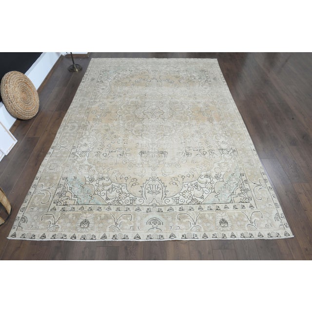 Vintage Persian Hand-Knotted area rug is a semi-antique vintage area rug. The '70s Eastern region of Anatolian's unique...