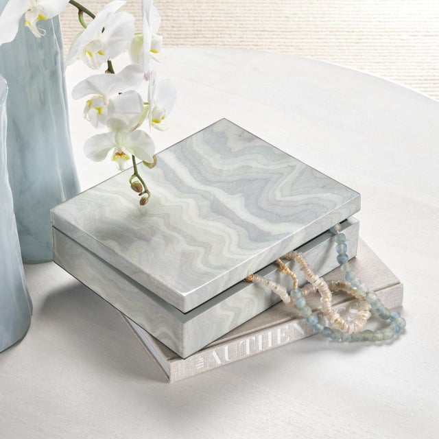 Elevation Decorative Box, Pale Blue Lacquer The inspired-by-nature patterns that embellish the exteriors of this box are...