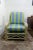 A stylish vintage bamboo and wicker armchair with a sculptural, airy frame that adds warmth and texture to any space....