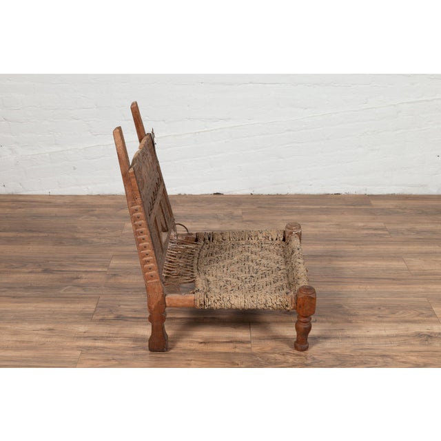 Rustic Indian Low Wooden Chair With Rope Seat and Weathered Appearance For Sale - Image 14 of 16