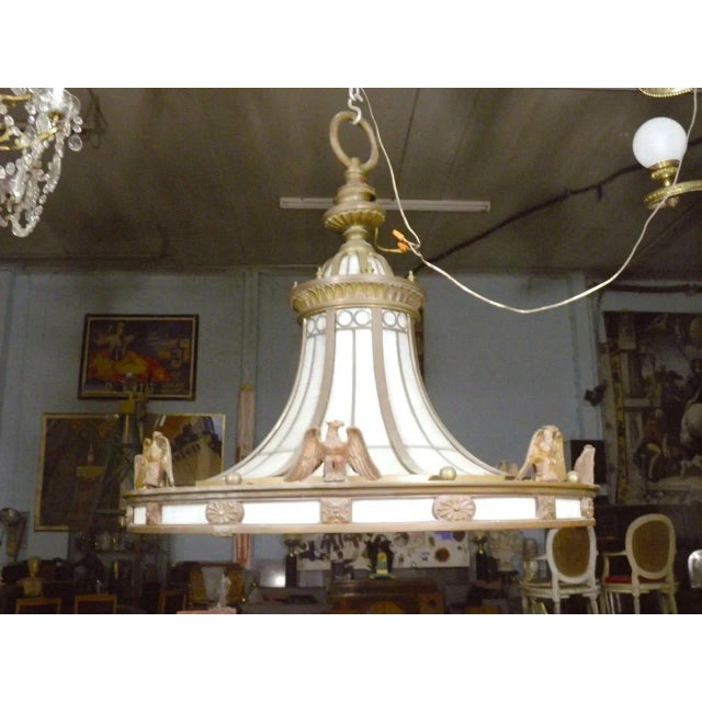 19th century. This rare incredible grand scale lobby chandelier known to be from the Roxy Theatre --A tour de force of...