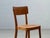 A simple yet distinctive vintage wooden chair from switzerland, with the original workshop label from the a. Brandenberg...