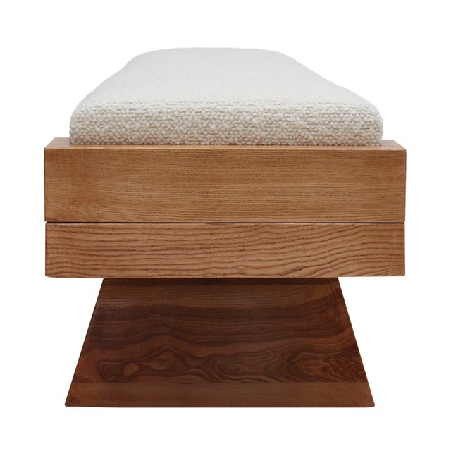 Contemporary Italian bench in a striking Brutalist style, featuring sculptural, architectural lines. The piece consists of...