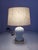 Vintage table lamp attributed to Tommaso Barbi, made in Italy in the 1980s, characterized by a strong decorative and...