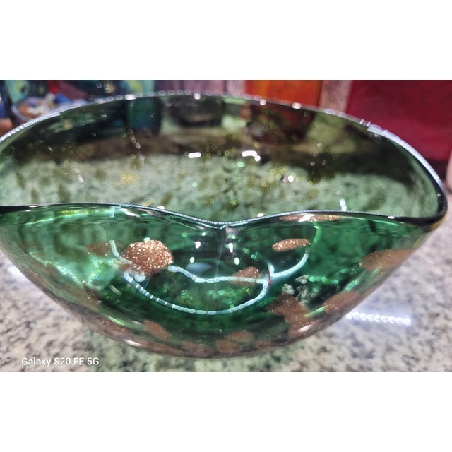 Spectacular Mid-Century Murano art glass folded bowl in emerald green with abundant copper aventurine flecks. This large...