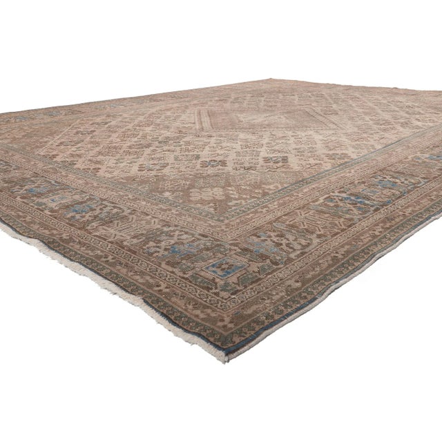 78597 Distressed Antique Persian Joshegan Rug, 10'00 x 13'06. Traditional sensibility meets effortlessly chic in this...