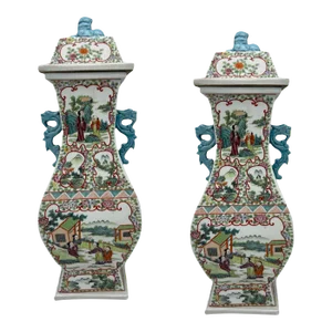 Early 20th Century Chinese Enameled Porcelain Lid Covered Footed Vases in Multicolor with Dragon Handles- a Pair